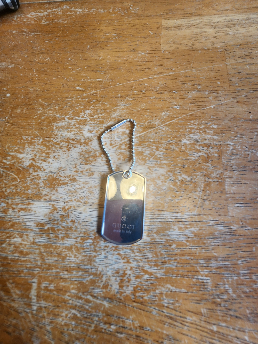 Gucci Sterling Silver Dog Tag Keychain featuring a polished rectangular plate